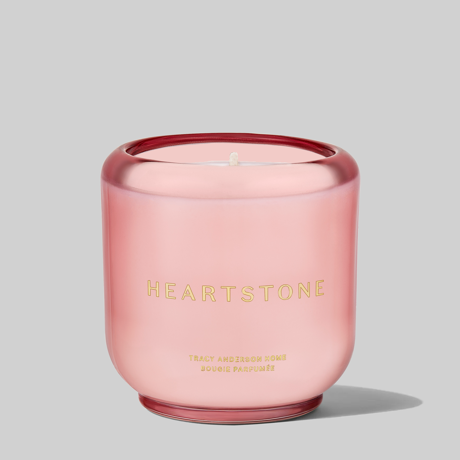 A close-up of the 6.5 oz HeartStone Scented Candle by Tracy Anderson Fragrance.